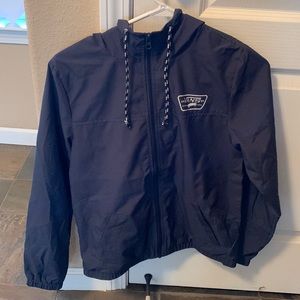 Navy blue Vans windbreaker.